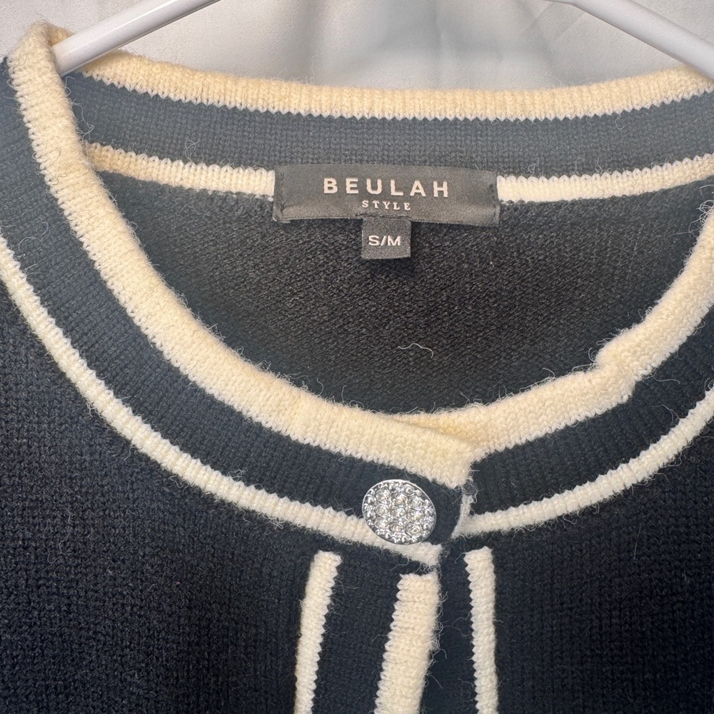 Beulah Black Knit Cardigan with Ivory Trim and Pearl Star Pockets - Picture 8 of 9